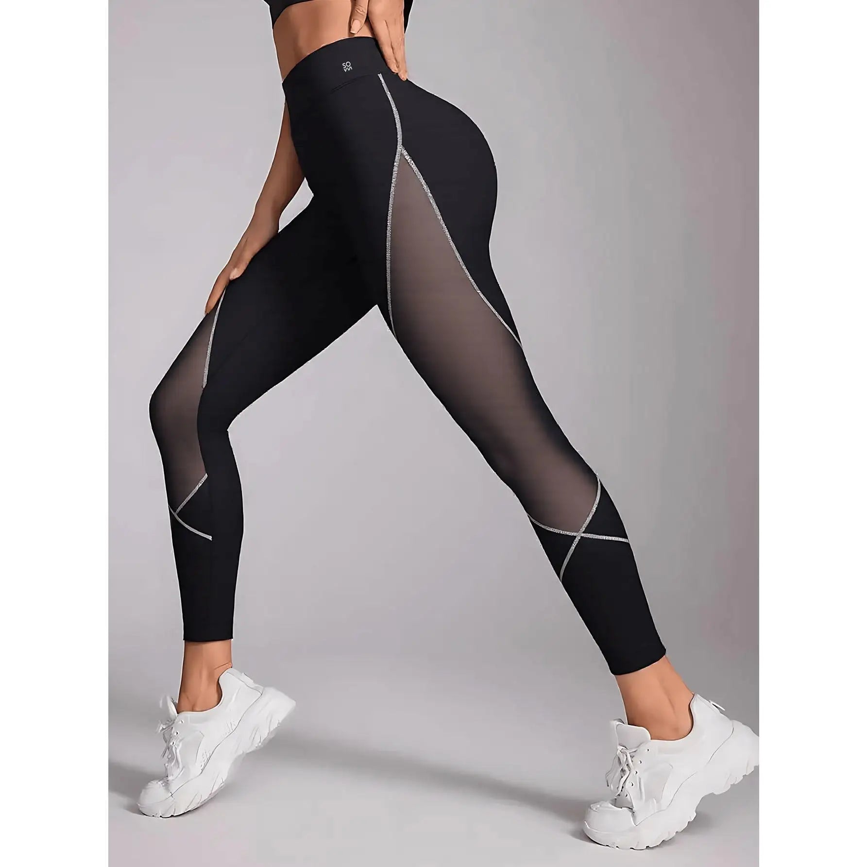 Women's sports pants with color blocked mesh design suitable for various sports